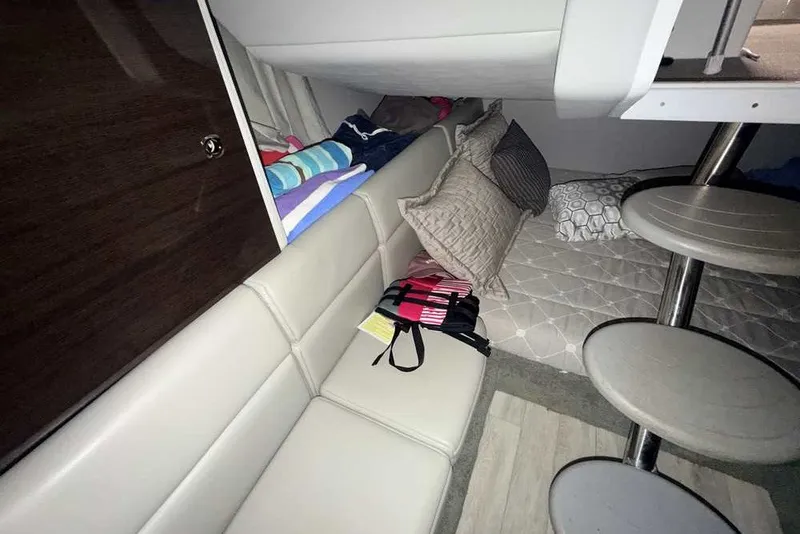 Slide: The Image of Interior cabin of 2019 Formula 350 Crossover Bowrider I/O with seating and bedding. - 37