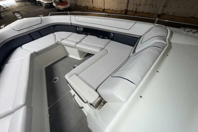 Slide: The Image of 2019 Formula 350 Crossover Bowrider I/O with spacious white seating area. - 26
