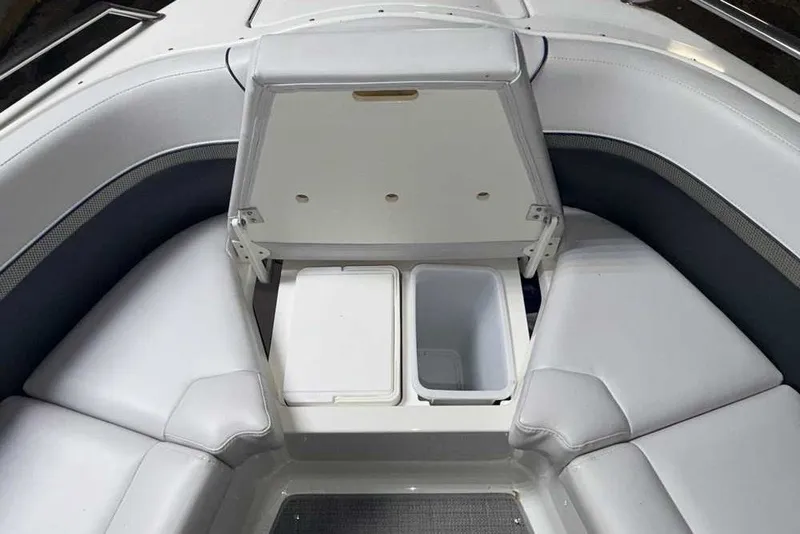 Slide: The Image of 2019 Formula 350 Crossover Bowrider I/O with open storage compartment in bow seating area. - 29