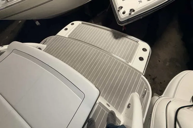 Slide: The Image of 2019 Formula 350 Crossover Bowrider I/O swim platform, featuring sleek design and spacious layout. - 2