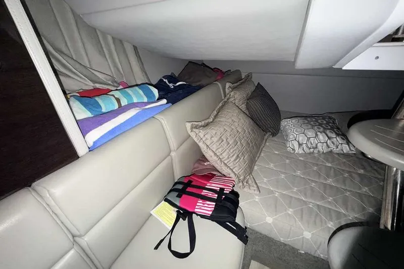 Slide: The Image of Interior cabin of 2019 Formula 350 Crossover Bowrider I/O with cushions and life jacket. - 38