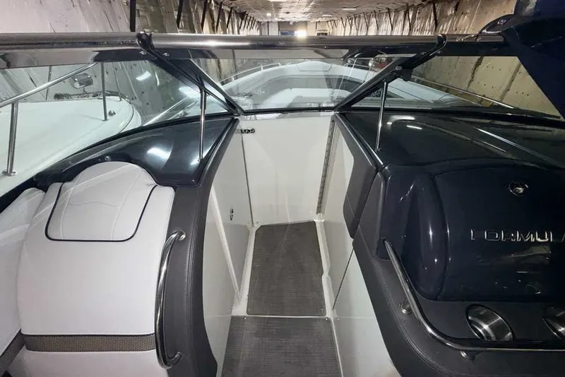 Slide: The Image of 2019 Formula 350 Crossover Bowrider I/O interior with sleek design and comfortable seating. - 24