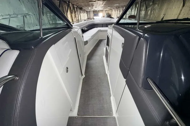 Slide: The Image of 2019 Formula 350 Crossover Bowrider I/O interior view, showcasing sleek design and spacious seating. - 23