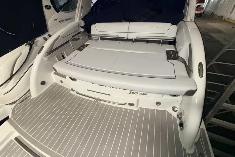 Slide: The Image of 2019 Formula 350 Crossover Bowrider I/O boat interior with cushioned seating and sleek design. - 4