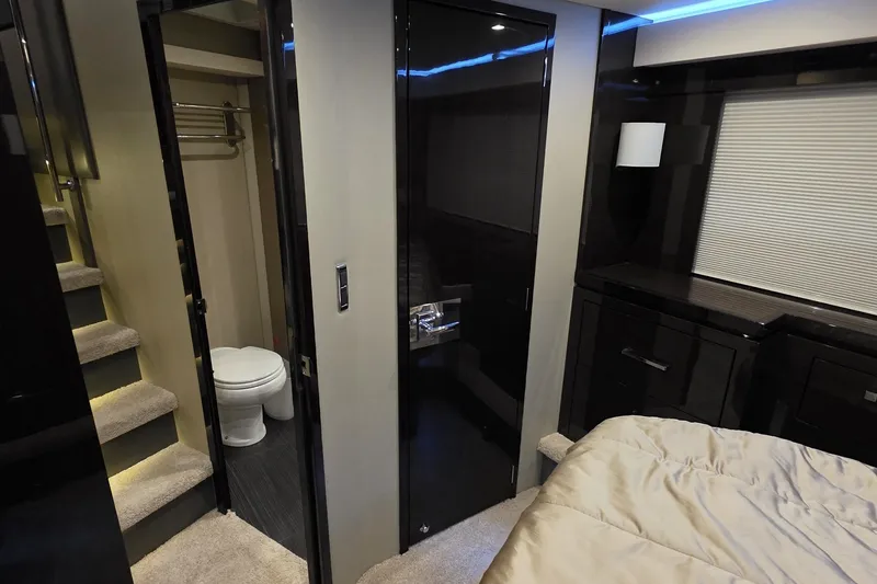 Slide: The Image of Luxurious interior of 2018 Carver C52 Coupe yacht with modern bathroom and bedroom. - 44