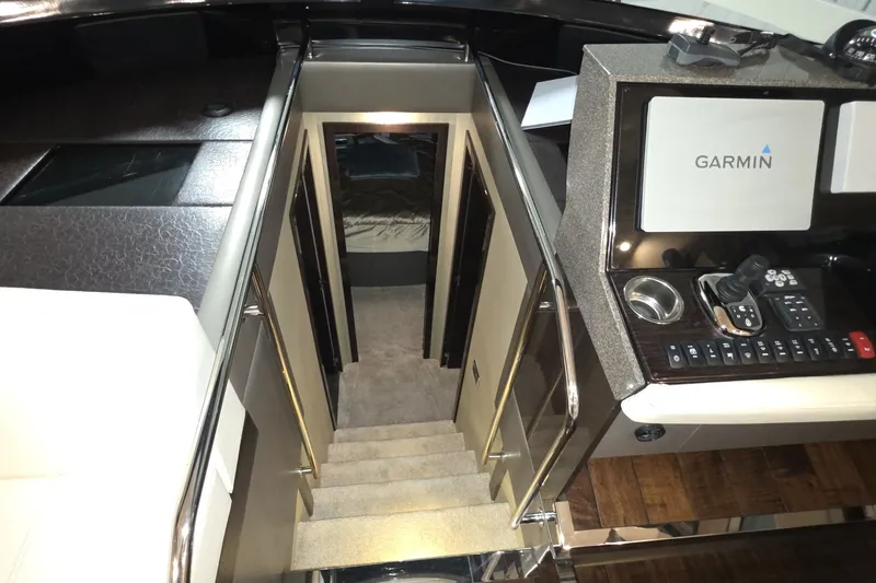 Slide: The Image of Interior view of 2018 Carver C52 Coupe yacht with Garmin navigation system. - 20