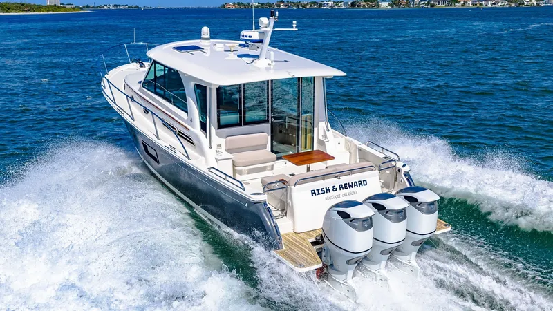 Slide: The Image of Aft Deck and Triple Outboards - 50
