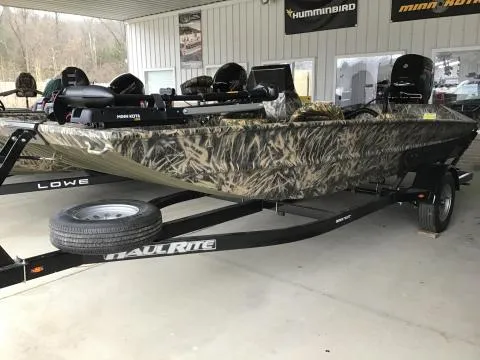 Slide: The Image of Southfork 1656 Camo Jet Boat 2026 - 2