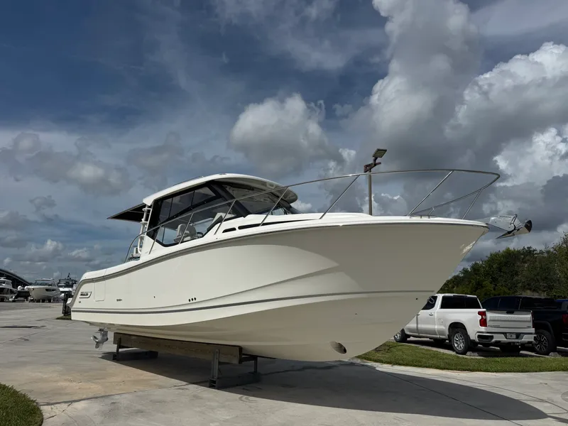 Slide: The Image of Boston Whaler 325 CONQUEST 2026 - 2