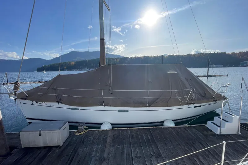 Slide: The Image of 2007 Beneteau 393 sailboat docked with full cover - 22