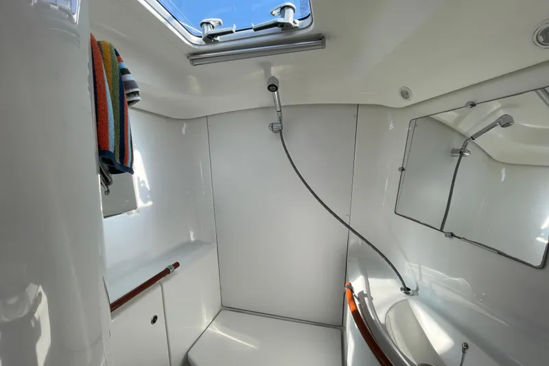 Slide: The Image of Interior of 2007 Beneteau 393 yacht head with shower and mirror. - 7