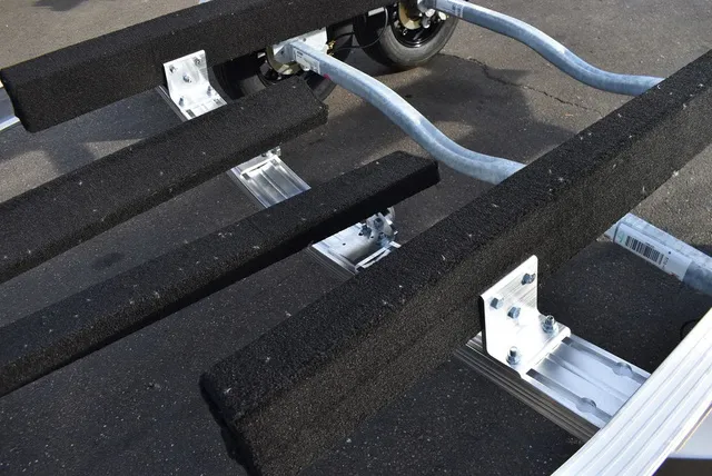 Slide: The Image of Yacht Club Trailers 23-6000 Aluminum tandem axle bunk boat trailer 2026 - 8