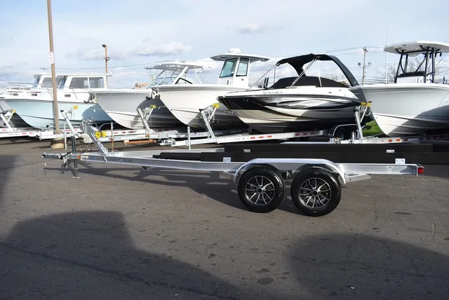 Slide: The Image of Yacht Club Trailers 23-6000 Aluminum tandem axle bunk boat trailer 2026 - 5