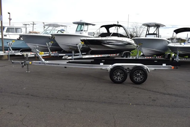 Slide: The Image of Yacht Club Trailers 23-6000 Aluminum tandem axle bunk boat trailer 2026 - 2
