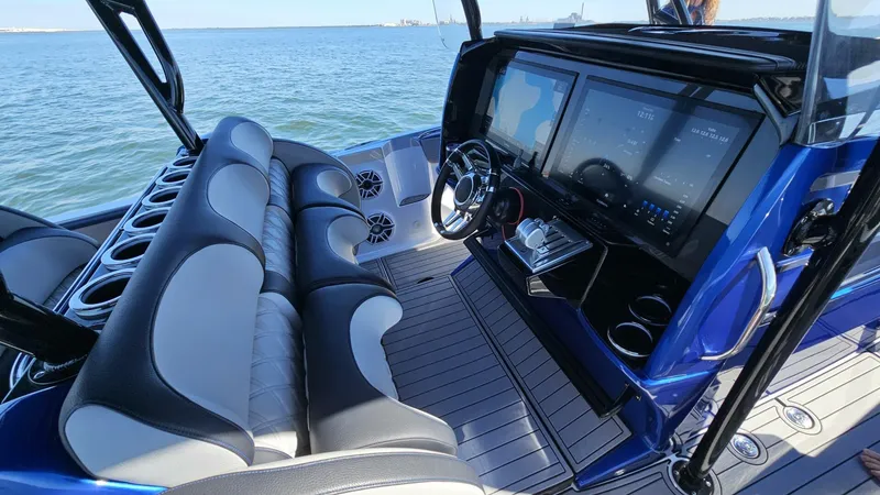 Slide: The Image of Nor-Tech 390 Sport Center Console 2024 - 23