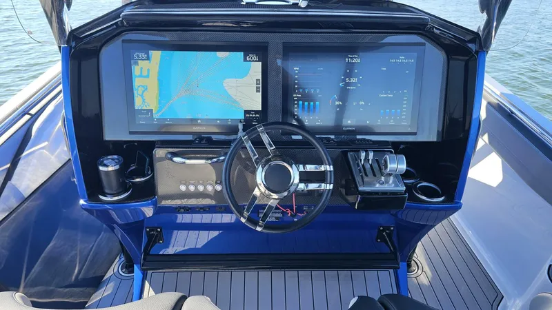 Slide: The Image of Nor-Tech 390 Sport Center Console 2024 - 26