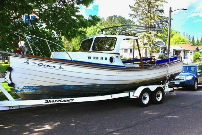 Slide: The Image of Grover Verity Skiff 1990 - 2