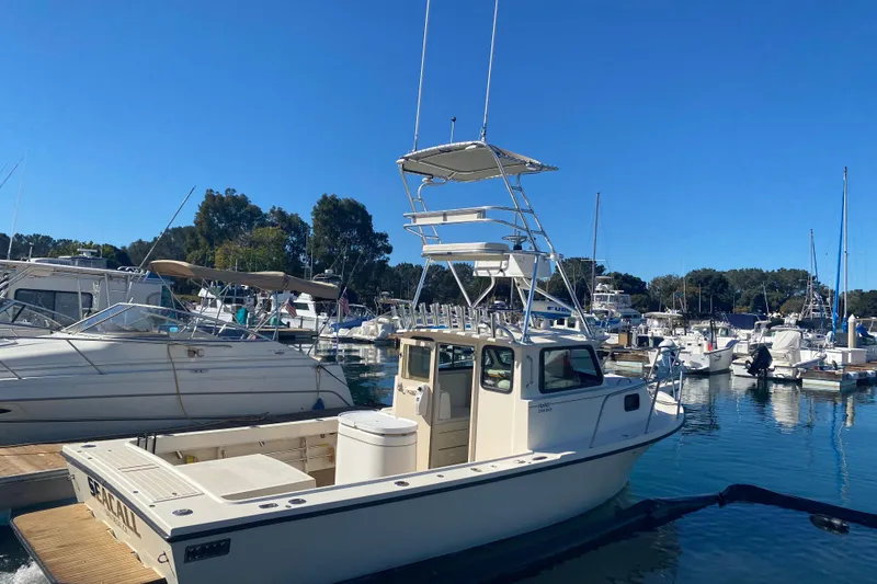 The Image of Parker Marine 2520 XLD Sport Cabin 2000 - 0