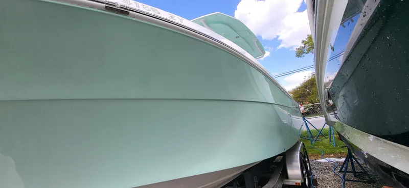 Slide: The Image of Aquasport 2500 Center Console 2021 - 25