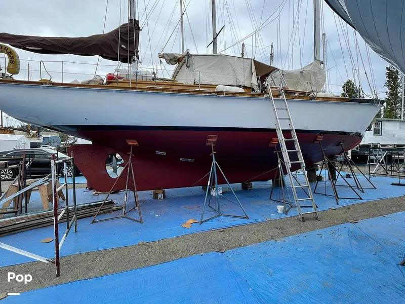 Slide: The Image of New bottom paint Aug 2021.  Prepping for coat 2 above waterline. - 9317790