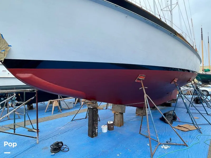 Slide: The Image of New bottom paint Aug 2021.  Prepping for coat 2 above waterline. - 9317792