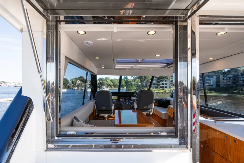 Slide: The Image of Riviera 57 Enclosed Flybridge 2023 - 61