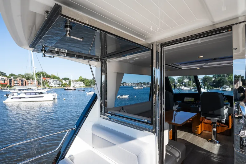 Slide: The Image of Riviera 57 Enclosed Flybridge 2023 - 60