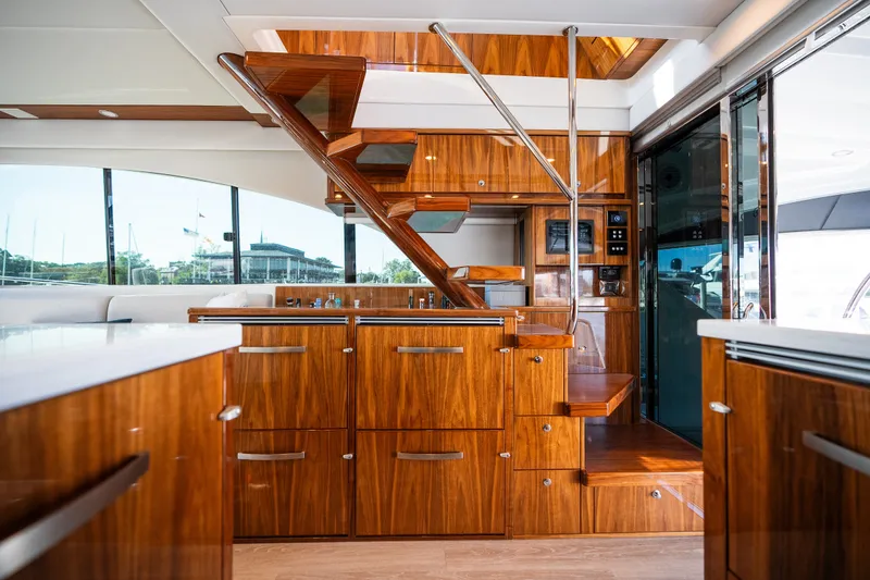 Slide: The Image of Riviera 57 Enclosed Flybridge 2023 - 25