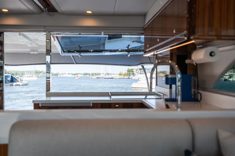 Slide: The Image of Riviera 57 Enclosed Flybridge 2023 - 17