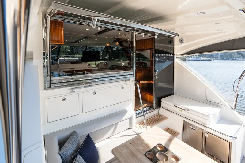 Slide: The Image of Riviera 57 Enclosed Flybridge 2023 - 56