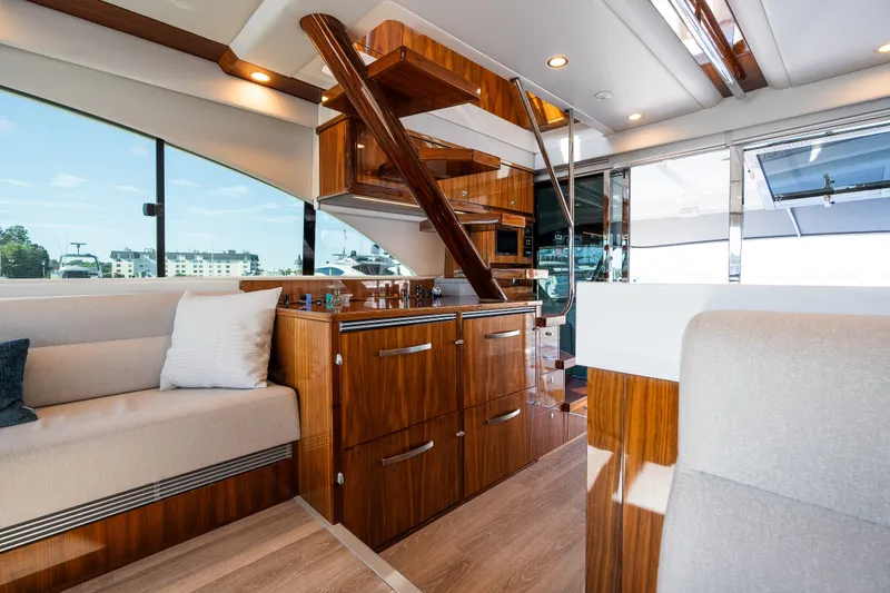 Slide: The Image of Riviera 57 Enclosed Flybridge 2023 - 18