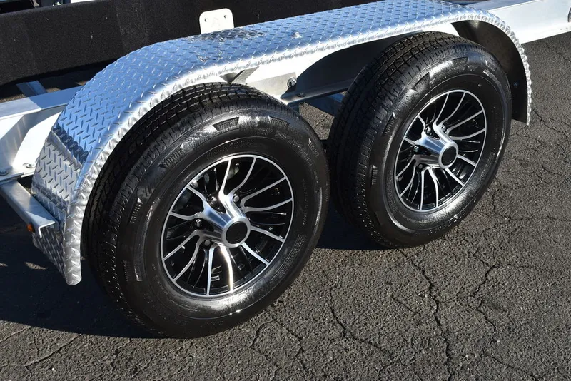 Slide: The Image of Yacht Club Trailers Yacht Club Boat Trailers 27-8000 Aluminum tandem axle bunk boat trailer 2026 - 4