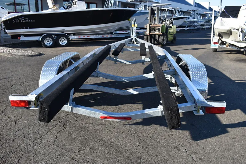 Slide: The Image of Yacht Club Trailers Yacht Club Boat Trailers 27-8000 Aluminum tandem axle bunk boat trailer 2026 - 6