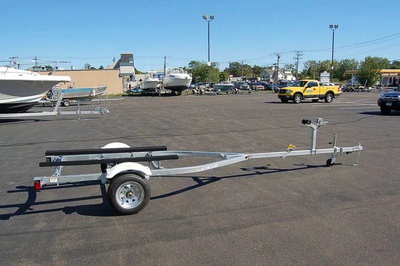 Slide: The Image of Yacht Club Trailers 21-6000 Aluminum tandem axle bunk boat trailer 2026 - 40