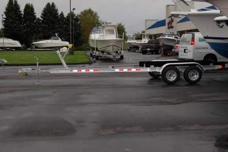 Slide: The Image of Yacht Club Trailers 21-6000 Aluminum tandem axle bunk boat trailer 2026 - 57