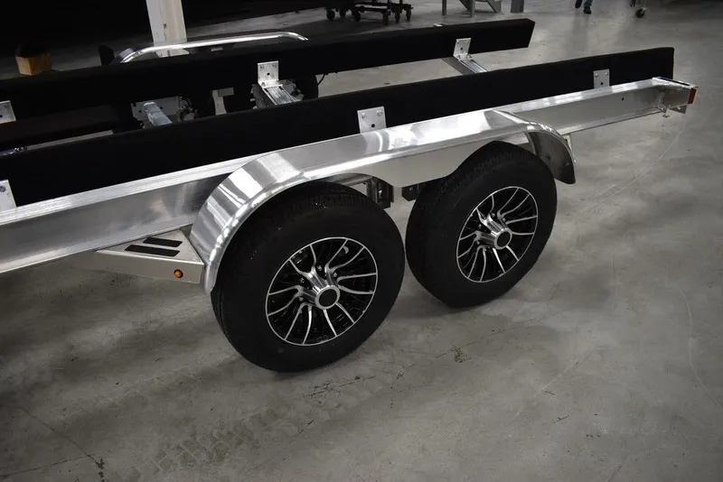 Slide: The Image of Yacht Club Trailers Yacht Club Boat Trailers 25-7000 Aluminum Tandem Axle Bunk boat trailer 2026 - 4