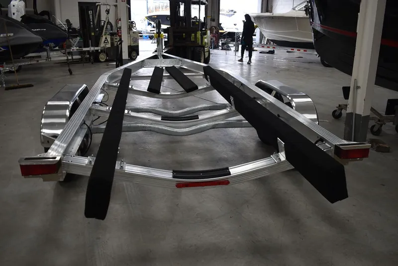 Slide: The Image of Yacht Club Trailers Yacht Club Boat Trailers 25-7000 Aluminum Tandem Axle Bunk boat trailer 2026 - 5