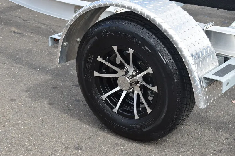 Slide: The Image of Yacht Club Trailers 19-30 Aluminum single axle bunk boat trailer 2026 - 2