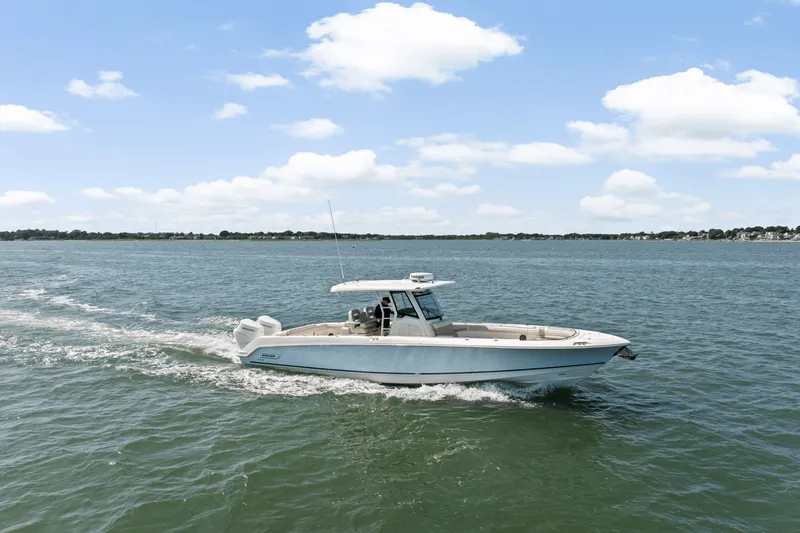 Slide: The Image of Boston Whaler 330 Outrage 2025 - 2