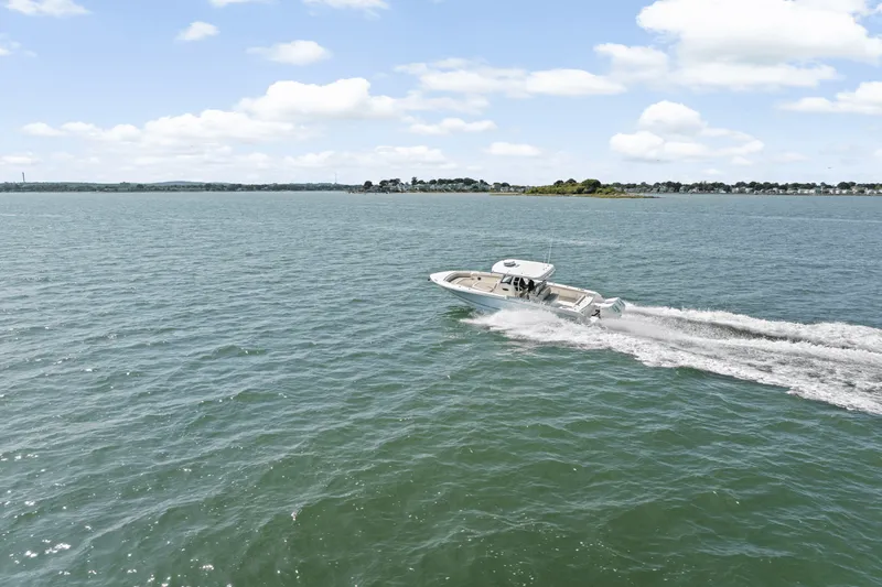 Slide: The Image of Boston Whaler 330 Outrage 2025 - 57