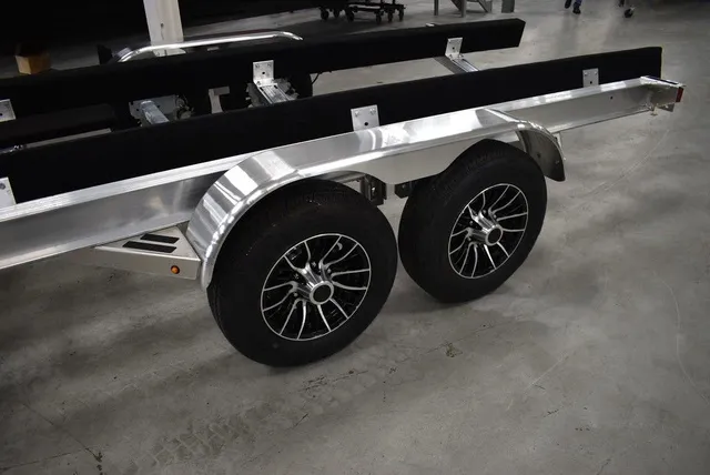 Slide: The Image of Yacht Club Trailers 25-7000 Aluminum Tandem Axle Bunk boat trailer 2026 - 4
