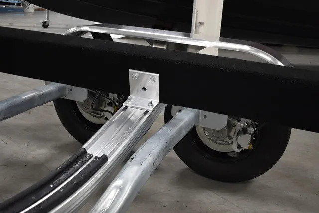 Slide: The Image of Yacht Club Trailers 25-7000 Aluminum Tandem Axle Bunk boat trailer 2026 - 6