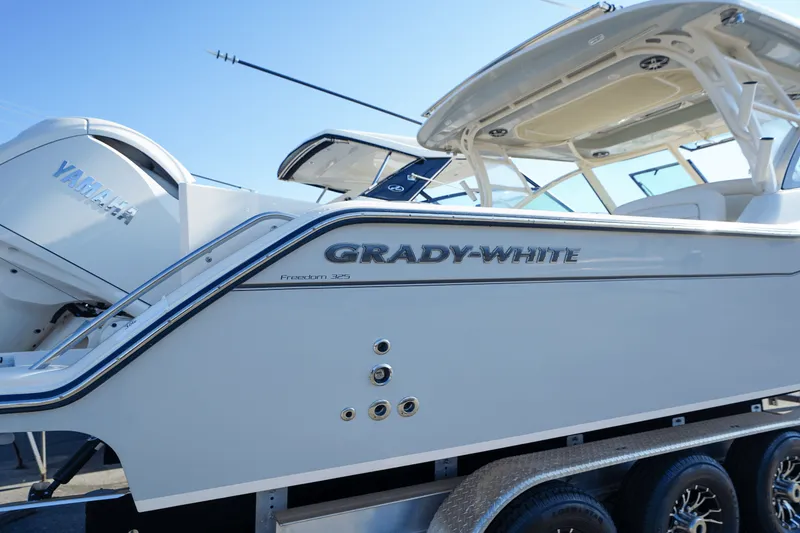 Slide: The Image of Grady-White Freedom 325 2025 - 2