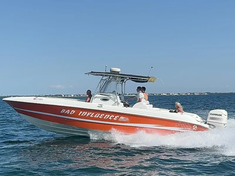 Slide: The Image of Wellcraft 32 Scarab Sport 2002 - 1