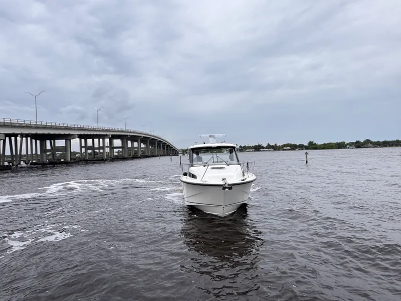 Slide: The Image of Boston Whaler 325 Conquest 2026 - 2