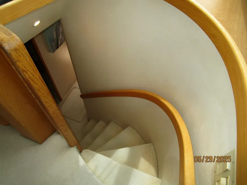 Slide: The Image of 58' West Bay guest companionway stairs - 5412762