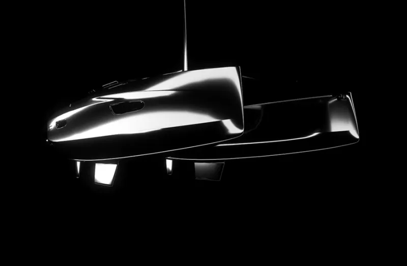 Slide: The Image of Excess 14 The asymmetrical hull design of this sleek catamaran minimize the impact of waves and maintain performance. - 3450144