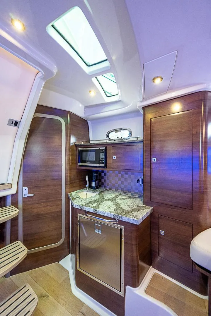 Slide: The Image of Cabin, Galley 2018 Boston Whaler 345 Conquest Paradise 4 Reels - 3638750