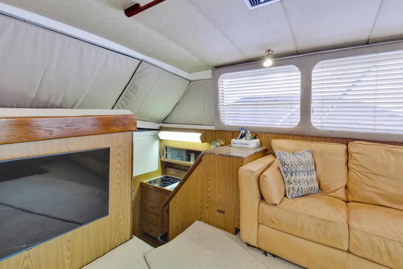 Slide: The Image of 1981 Bertram 42 Convertible Balls To The Wall Salon Starboard - 3686906