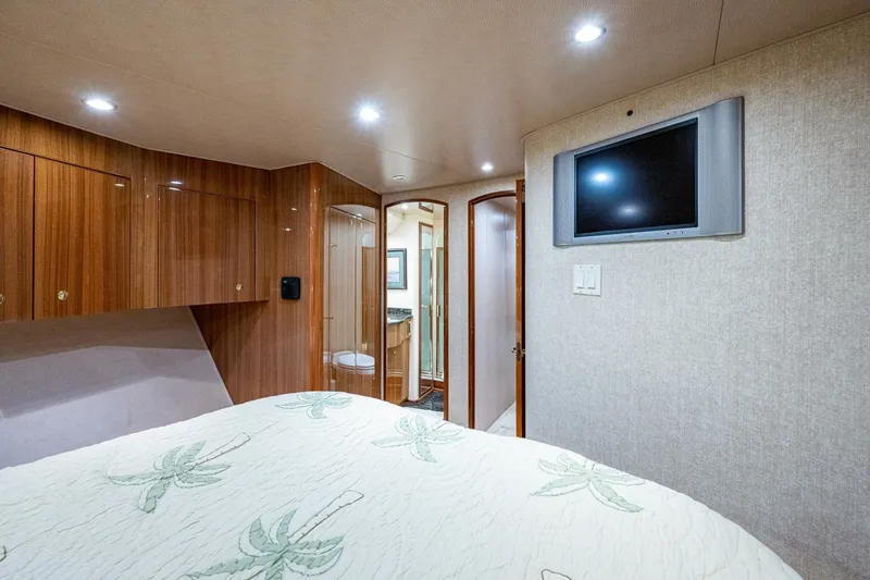 Slide: The Image of Forward Stateroom 2005 Viking 74 Convertible - Reel Estate - 7658383